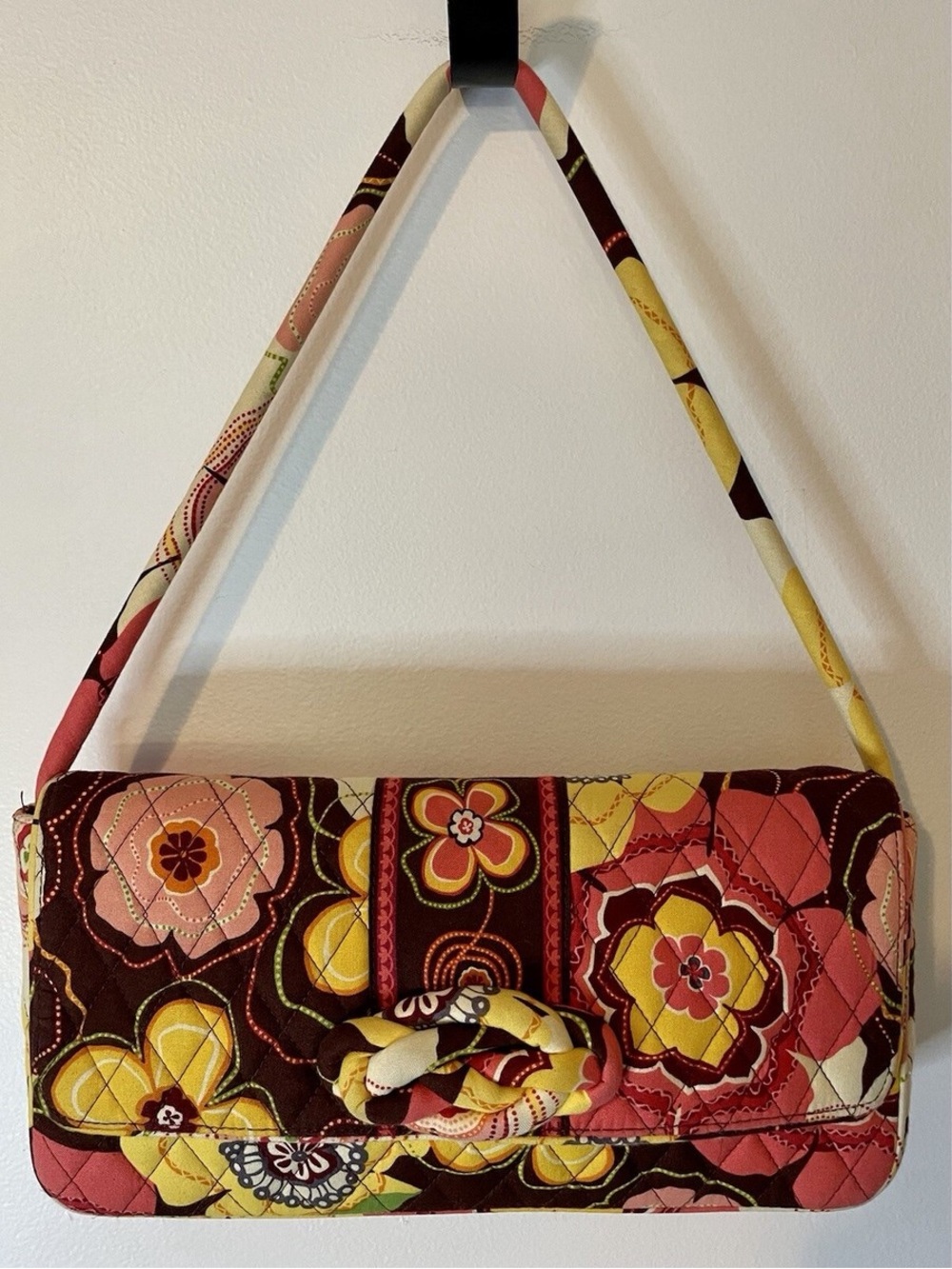 Vera Bradley "Knot Just A Clutch" in the retired Buttercup floral